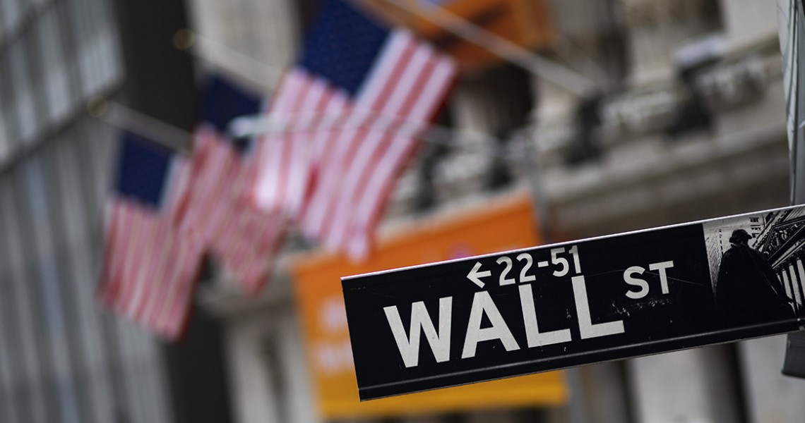 FILE - This Jan. 31, 2020, file photo shows a Wall Street sign in front of the New York Stock Exchange. (AP Photo/Mark Lennihan, File)